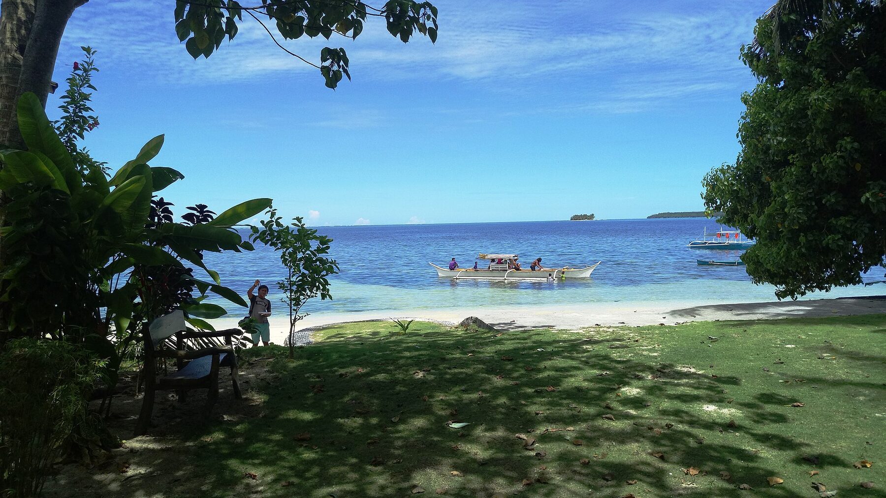 Bancas moored off the reef flat at Siargao
