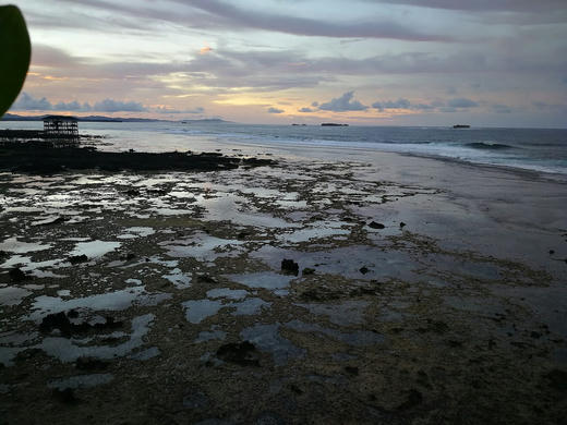 Sunset over the Cloud 9 reef at low tide, General Luna, Siargao