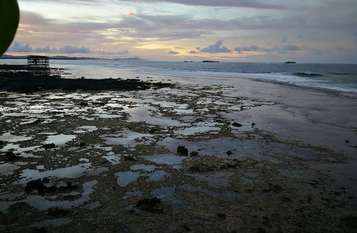 Sunset over the Cloud 9 reef at low tide, General Luna, Siargao