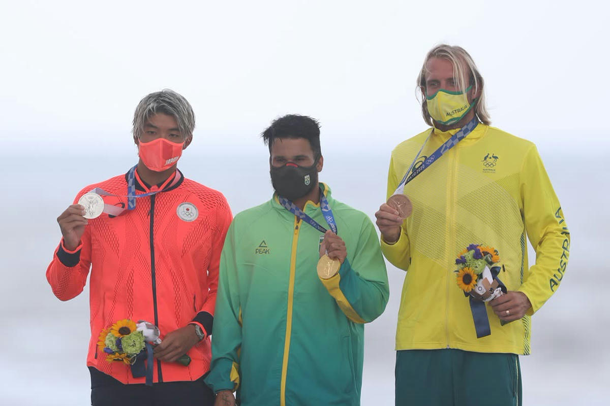 Kanoa Igarashi, Italo Ferreira and Owen Wright on the Olympic surfing podium in Tokyo, 2021